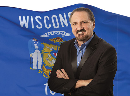 Jon Aleckson with the Wisconsin state flag